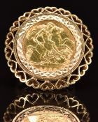 A 9ct gold ring set with a 1982 gold full sovereign, 10.6g, size K