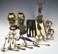 Pair of gilt metal and blacked vases, height 25cm, pair of menu holder or similar figures atop