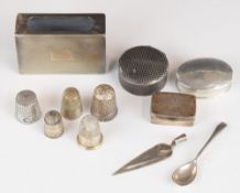 Three silver pill boxes comprising niello decorated example stamped 830 and two hallmarked examples,