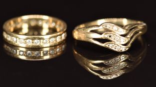 A 9ct gold eternity ring set with paste and a 9ct gold ring set with diamonds (missing one diamond),
