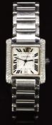 Cartier Tank Francaise automatic wristwatch ref. 2302 with date aperture, blued hands, black Roman