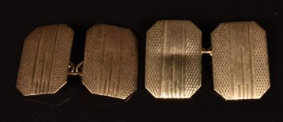 A pair of 9ct gold engine turned cufflinks, 2.4g
