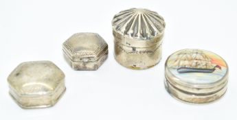 Four hallmarked silver and white metal pill boxes comprising modern hallmarked silver circular
