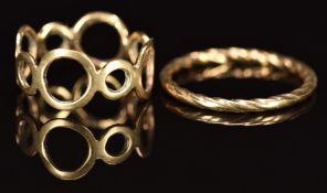 Two 9ct gold rings, one with pierced circular decoration, 3.2g, size K & P