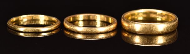 Three 22ct gold wedding bands / rings including one octagonal, Birmingham 1936, 8.9g, size J/K, size