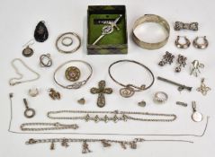 A collection of mainly silver jewellery including bangles, Cini silver earrings, bracelets, two