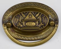 Georgian brass 'Sacred to Nelson, Trafalgar' drop handle, width 8.5cm