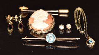 A 9ct gold brooch, Victorian yellow metal stick pin set with a pearl, 9ct gold cameo brooch, two
