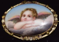 Victorian brooch set with a painted porcelain plaque depicting a cherub, 18.0g