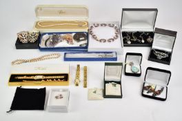 A collection of silver jewellery including bangle, pendants, earrings etc together with geological