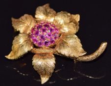 An 18ct gold brooch in the form of a flower and serpent set with Burmese rubies by RHB,16.7g