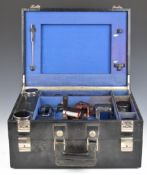 Art Deco style chrome and enamel travelling set, including bottles, brushes and pots, in two tier