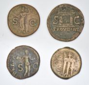 Four Roman copper / bronze coins including Elagabalus, smallest 24mm diameter, largest 29mm