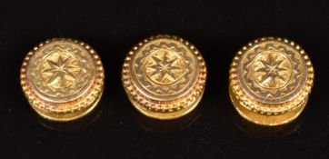 Three Victorian studs with engraved foliate decoration, 2.4g, in Victorian fitted box for Packer,