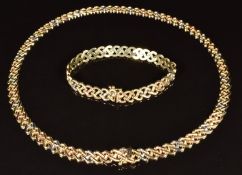 A 14k gold tri-coloured necklace and matching bracelet, lengths 17.5 and 43cm, 30.9g