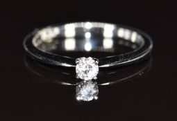 An 18k white gold ring set with a diamond of approximately 0.15ct, 2.6g, size M/N