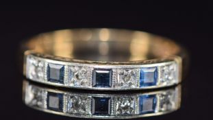 A 9ct gold half eternity ring set with sapphires and diamonds, 2.4g, size O