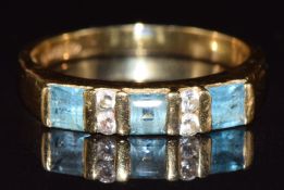 An 18ct gold ring set with topaz and paste, 3.5g, size P
