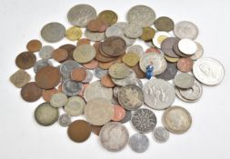 A collection of UK and overseas coinage including Victorian half crown and other silver content,