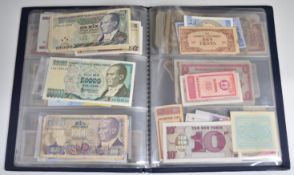 A collection of world banknotes in an album, includes AK47 £5, consecutive £1 pair etc
