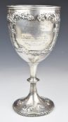 Victorian hallmarked silver trophy cup or large goblet with embossed decoration of cattle, London