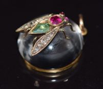 Victorian Essex crystal pendant mounted with a gold insect set with rose cut diamonds, emerald and