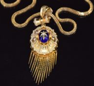 Victorian Etruscan Revival pendant set with blue enamel and a split pearl in a star setting, with