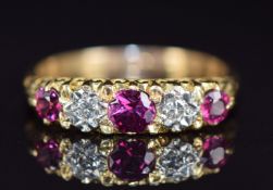 An 18ct gold ring set with rubies and diamonds, 3.4g, size K