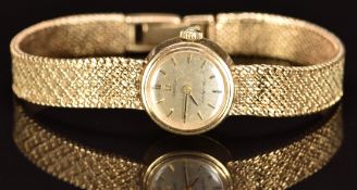 Omega DeVille ladies wristwatch ref. 1450 with gold hands, black Roman numerals, gold dial, gold