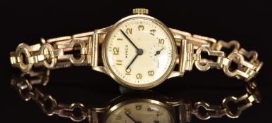 Hirco 9ct gold ladies wristwatch with inset subsidiary seconds dial, blued hands, gold Arabic