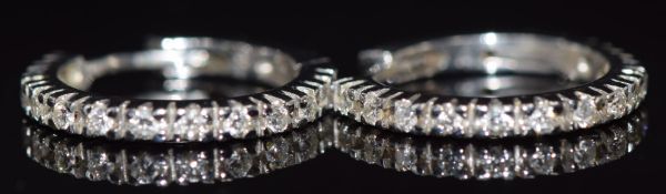 A pair of 18k white gold hoop earrings set with diamonds, 4g