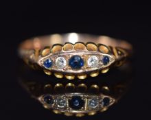 A 9ct gold ring set with sapphires and diamonds, Chester 1916, 1.6g, size T