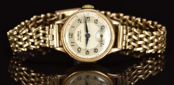 Buren 9ct gold ladies wristwatch with subsidiary seconds dial, blued hands, Arabic numerals,