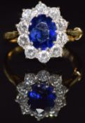 An 18ct gold ring set with an oval cut Ceylon sapphire of approximately 2.58ct surrounded by ten