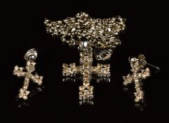 An 18ct white gold cross set with champagne diamonds, with matching earrings, 7.2g