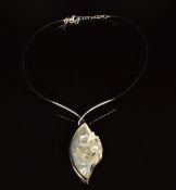 Lalique silver wire necklet/ necklace set with a glass 'Acrobat' pendant, the silver and frosted