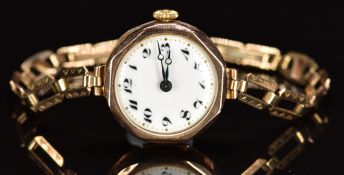 English 9ct gold ladies wristwatch with blued Breguet hands, black Arabic numerals, white dial and