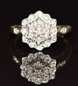 A 9ct gold ring set with a cluster of diamonds, 3,1g, size L/M