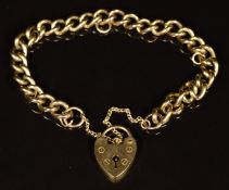 A 9ct gold curb link bracelet with heart padlock, 21.8g