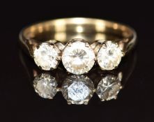 A 9ct gold ring set with three cubic zirconia, 2.7g, size P