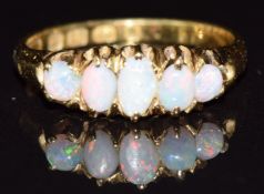 Victorian 18ct gold ring set with five opal cabochons, Birmingham 1881, 2.2g, size J