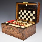 Late 19thC walnut cased games compendium, the domed lid opening to reveal a fitted satinwood