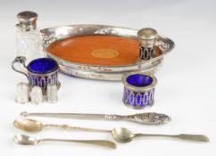 Hallmarked silver items comprising cut glass silver mounted scent bottle, oval tray with silver rim,