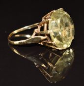 A 9ct gold ring set with a round cut citrine, 5.6g, size S