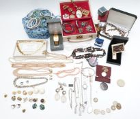 A collection of jewellery including silver chain, filigree brooch, silver pendant, Ola Gorie brooch,