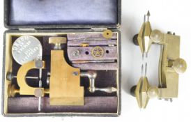 Cased CW2 brass watchmaking / repairing tool and a depthing tool