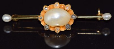 A 14ct gold brooch set with three natural pearls, the largest 7.6 x 11.2mm, and rose cut diamonds,