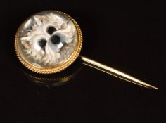 Victorian stick pin set with a carved Essex crystal depicting a hand painted with a white Westie