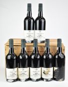 Seven bottles of Taylor's 1980 vintage port, 75cl, with original wooden case