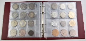 A comprehensive amateur coin collection contained in an album to include Henry VIII cut halfpenny,